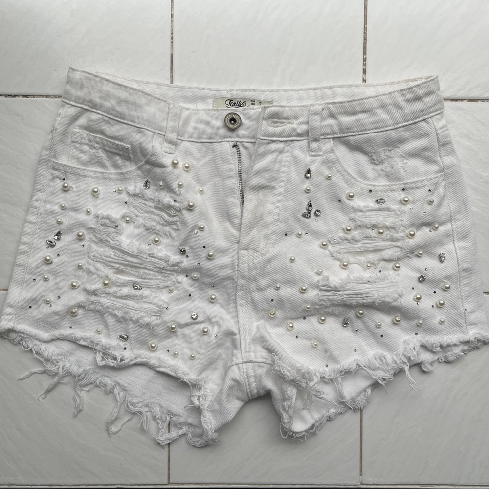 White distressed denim beaded shorts